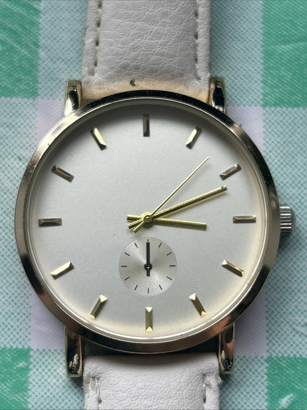 Accutime Gold Tone White Band Women’s Quartz Watch